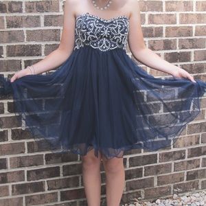 Navy blue strapless beaded dress perfect for hoco or prom! Only worn once.